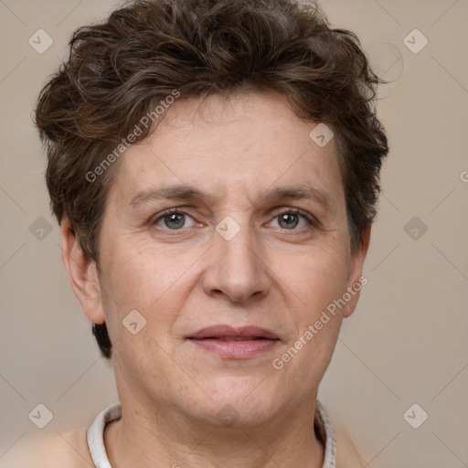 Joyful white adult female with short  brown hair and grey eyes