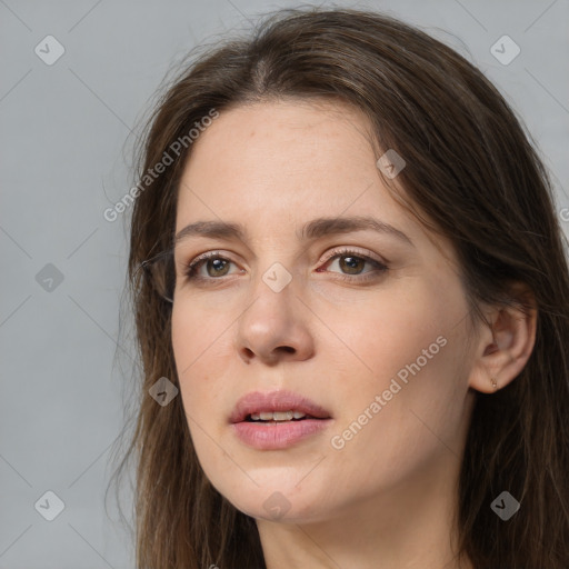 Neutral white young-adult female with long  brown hair and brown eyes