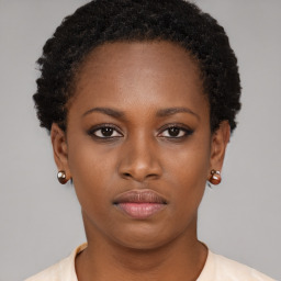 Neutral black young-adult female with short  brown hair and brown eyes