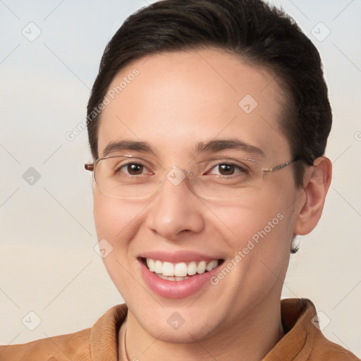 Joyful white young-adult female with short  brown hair and brown eyes