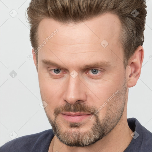 Neutral white adult male with short  brown hair and brown eyes