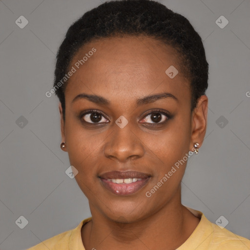 Joyful black young-adult female with short  black hair and brown eyes