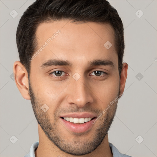 Joyful white young-adult male with short  brown hair and brown eyes