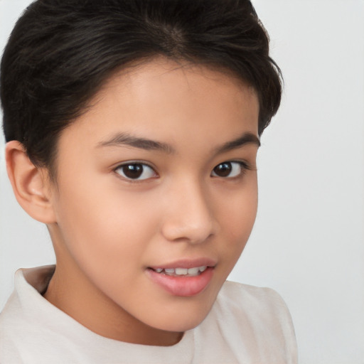 Joyful white child female with short  brown hair and brown eyes