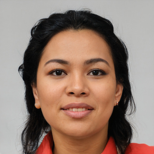Joyful asian young-adult female with medium  black hair and brown eyes