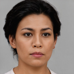 Neutral asian young-adult female with medium  brown hair and brown eyes