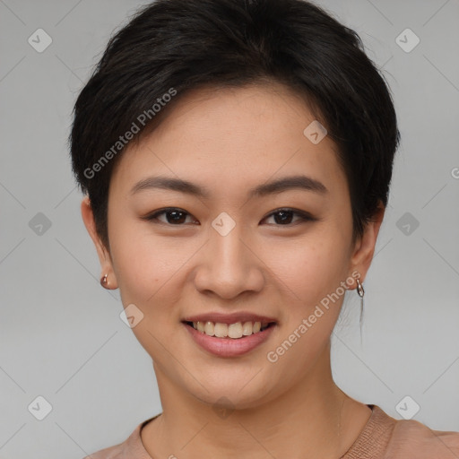 Joyful asian young-adult female with short  brown hair and brown eyes