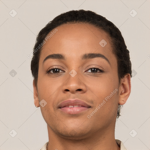 Joyful latino young-adult female with short  brown hair and brown eyes