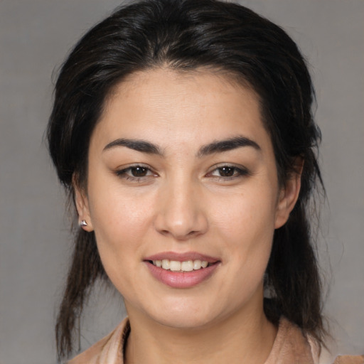 Joyful white young-adult female with medium  brown hair and brown eyes