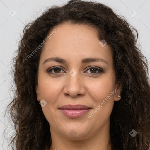 Joyful white adult female with long  brown hair and brown eyes