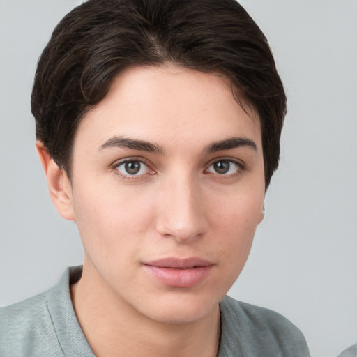 Neutral white young-adult female with short  brown hair and brown eyes