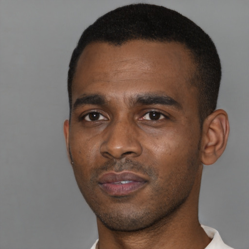Neutral black young-adult male with short  black hair and brown eyes