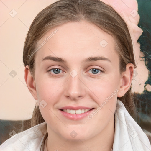 Joyful white young-adult female with medium  brown hair and blue eyes