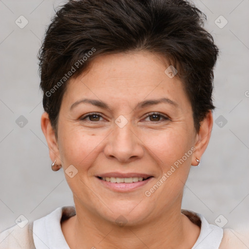 Joyful white adult female with short  brown hair and brown eyes