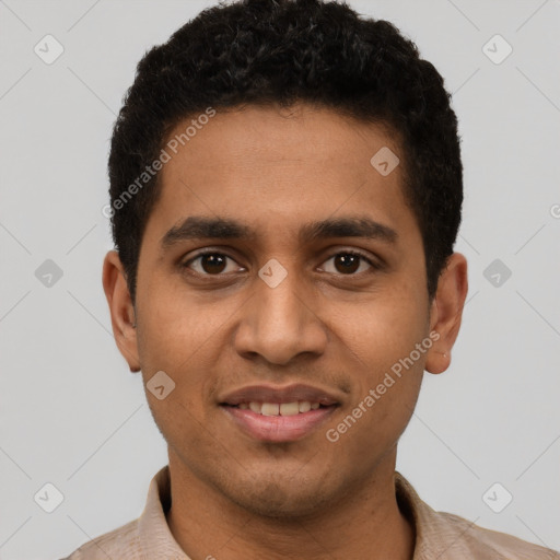 Joyful latino young-adult male with short  brown hair and brown eyes