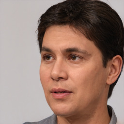 Neutral white adult male with short  brown hair and brown eyes