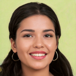 Joyful white young-adult female with long  black hair and brown eyes