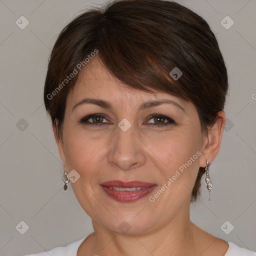 Joyful white adult female with medium  brown hair and brown eyes