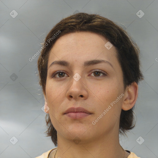 Neutral white young-adult female with short  brown hair and brown eyes