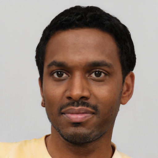 Neutral black young-adult male with short  black hair and brown eyes