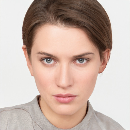 Neutral white young-adult female with short  brown hair and grey eyes