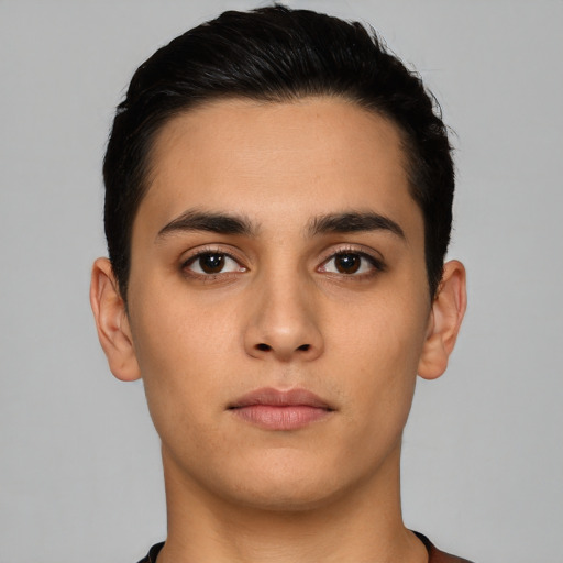 Neutral latino young-adult male with short  black hair and brown eyes