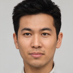 Neutral asian young-adult male with short  black hair and brown eyes