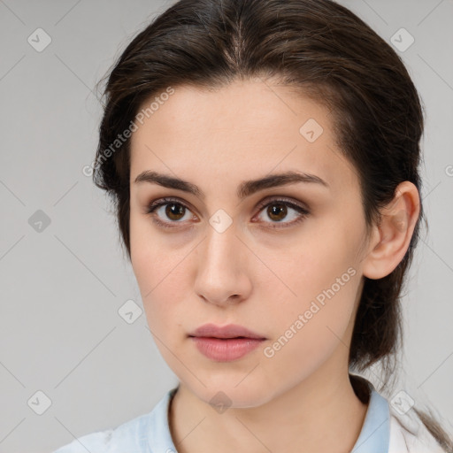 Neutral white young-adult female with medium  brown hair and brown eyes