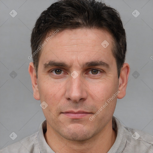 Neutral white adult male with short  brown hair and brown eyes