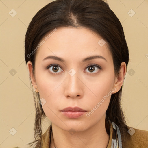 Neutral white young-adult female with long  brown hair and brown eyes