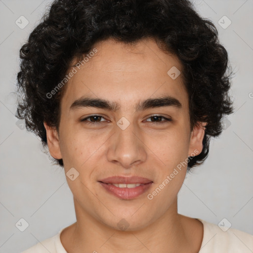 Joyful latino young-adult male with short  brown hair and brown eyes