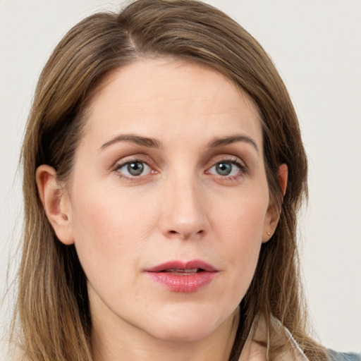 Neutral white young-adult female with long  brown hair and grey eyes