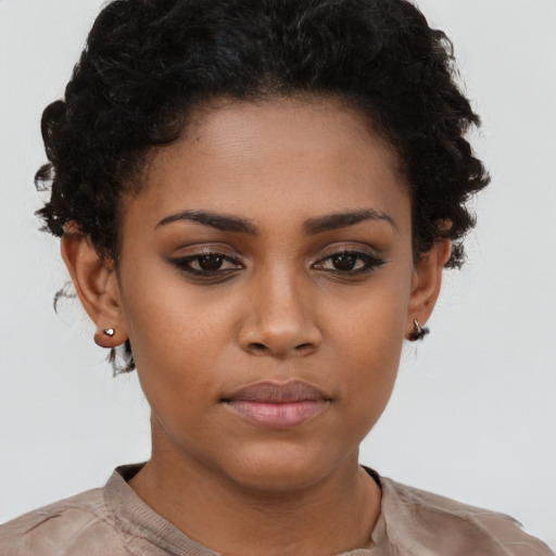 Neutral black young-adult female with short  brown hair and brown eyes