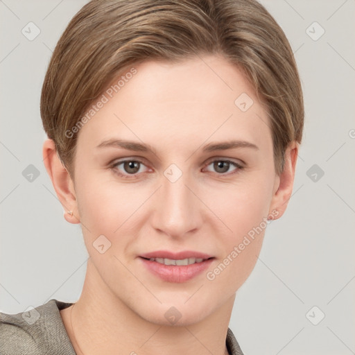 Joyful white young-adult female with short  brown hair and grey eyes