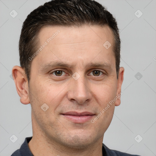 Joyful white adult male with short  brown hair and grey eyes