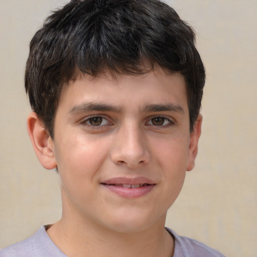 Joyful white child male with short  brown hair and brown eyes