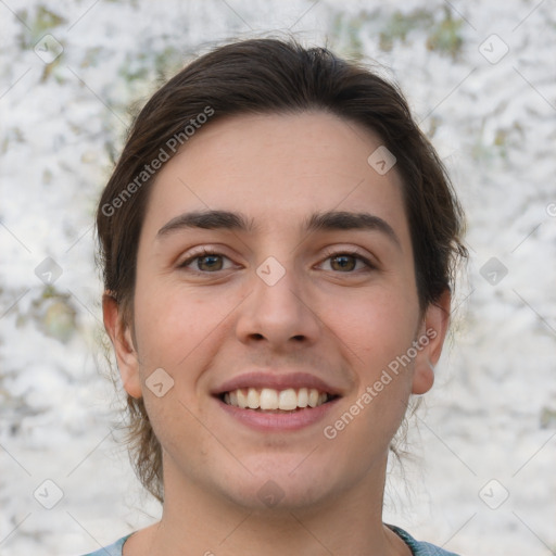 Joyful white young-adult male with medium  brown hair and brown eyes