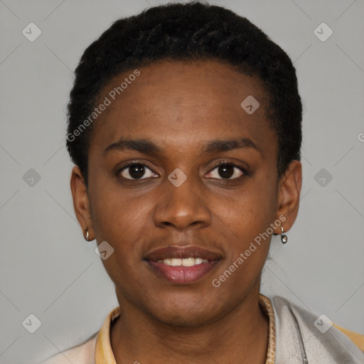 Joyful black young-adult female with short  black hair and brown eyes