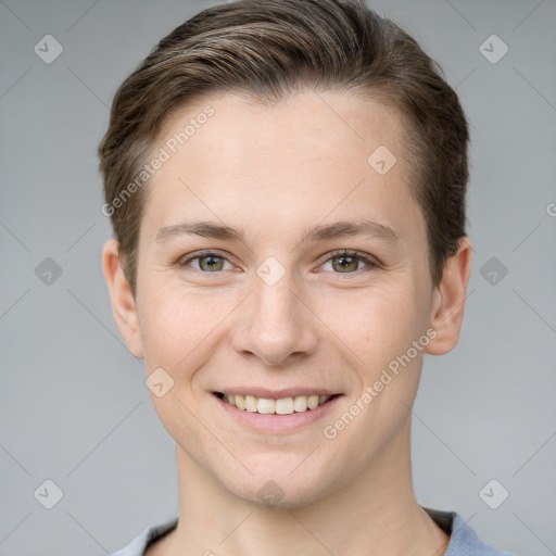 Joyful white young-adult female with short  brown hair and grey eyes