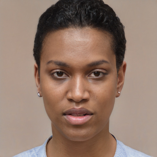 Joyful latino young-adult female with short  black hair and brown eyes