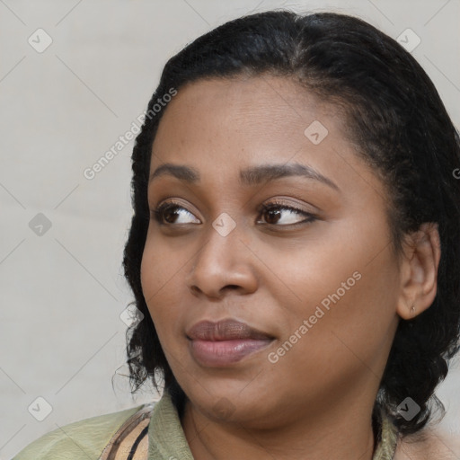 Joyful latino young-adult female with medium  black hair and brown eyes