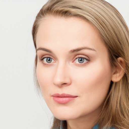 Neutral white young-adult female with long  brown hair and blue eyes