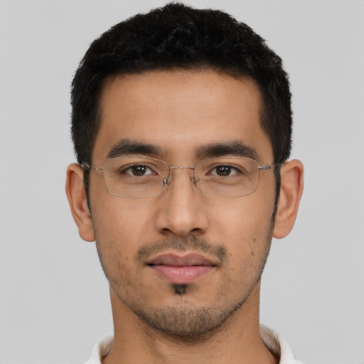 Neutral latino young-adult male with short  black hair and brown eyes