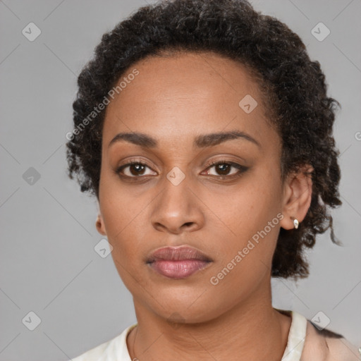 Neutral black young-adult female with short  brown hair and brown eyes