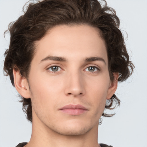 Neutral white young-adult male with medium  brown hair and brown eyes