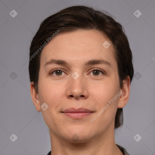 Joyful white young-adult female with short  brown hair and brown eyes