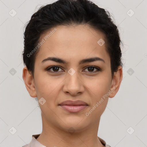 Joyful latino young-adult female with short  brown hair and brown eyes