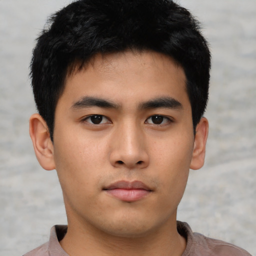 Neutral asian young-adult male with short  black hair and brown eyes
