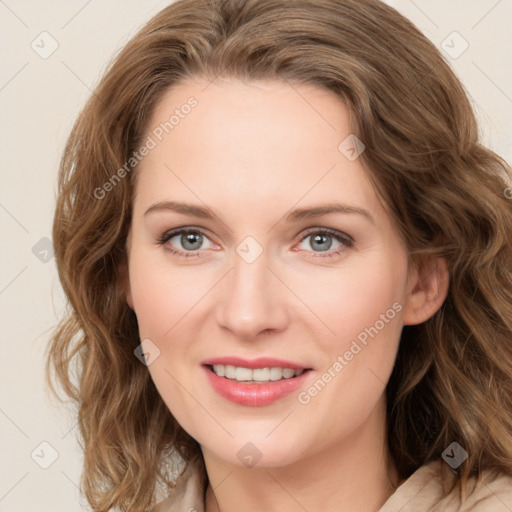 Joyful white young-adult female with medium  brown hair and green eyes