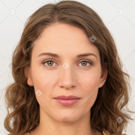 Joyful white young-adult female with long  brown hair and green eyes